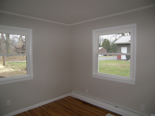 unfurnished room with dark wood-type flooring, a baseboard radiator, and ornamental molding