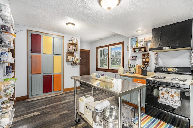 kitchen with exhaust hood, dark hardwood / wood-style flooring, a textured ceiling, and black range with gas cooktop