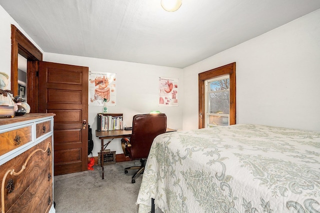 bedroom featuring light colored carpet