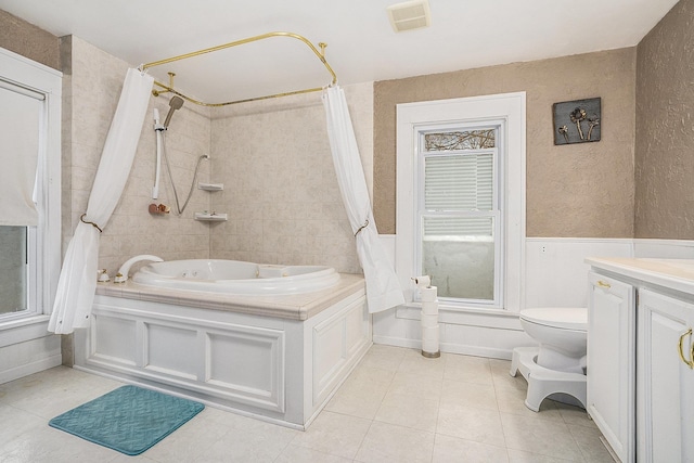 full bathroom with shower / bathtub combination with curtain, tile patterned flooring, vanity, and toilet