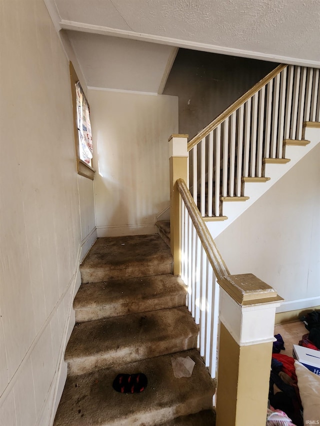 staircase featuring hardwood / wood-style floors