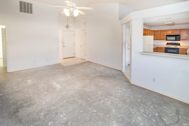 unfurnished living room featuring ceiling fan and vaulted ceiling