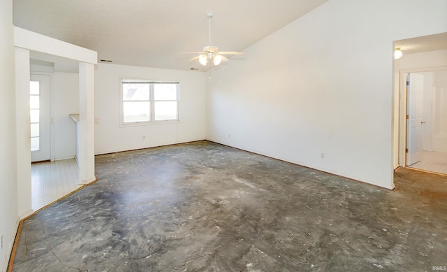 spare room featuring ceiling fan and lofted ceiling