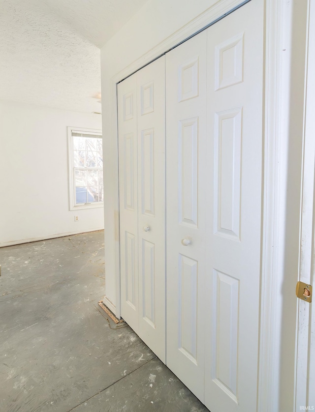 interior details with a textured ceiling