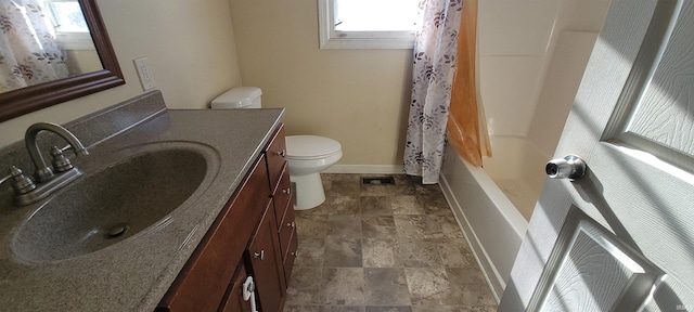 full bathroom with vanity, toilet, and shower / bath combo