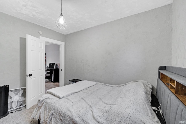 bedroom with light colored carpet