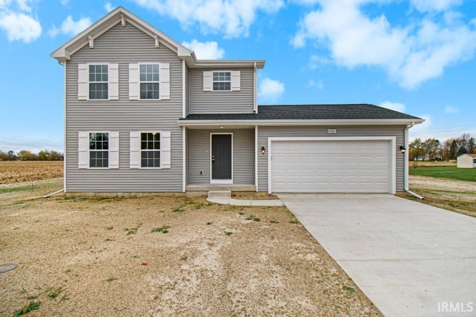 view of front property with a garage