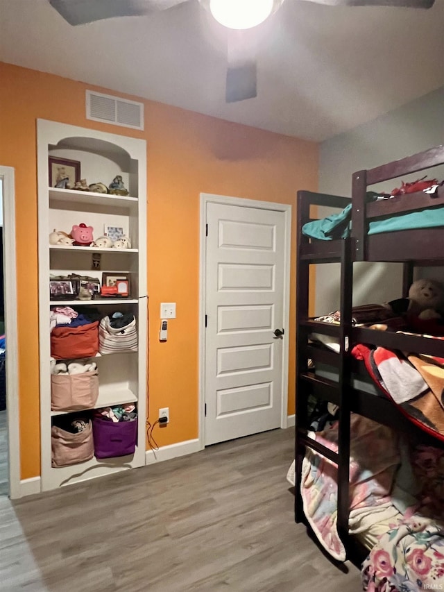 bedroom featuring hardwood / wood-style floors