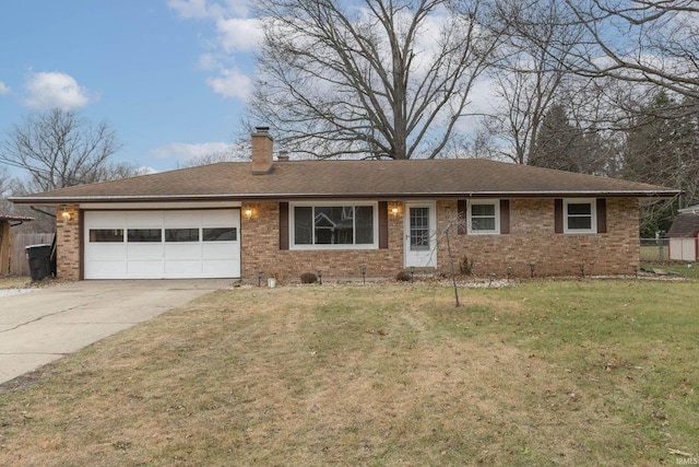 single story home featuring a garage and a front lawn