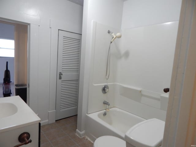 full bathroom featuring tile patterned flooring, vanity, shower / bathtub combination, and toilet