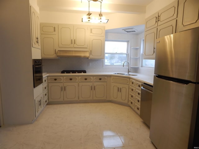 kitchen featuring black appliances, sink, decorative backsplash, light tile patterned flooring, and extractor fan