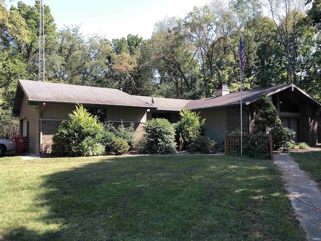 single story home featuring a front yard