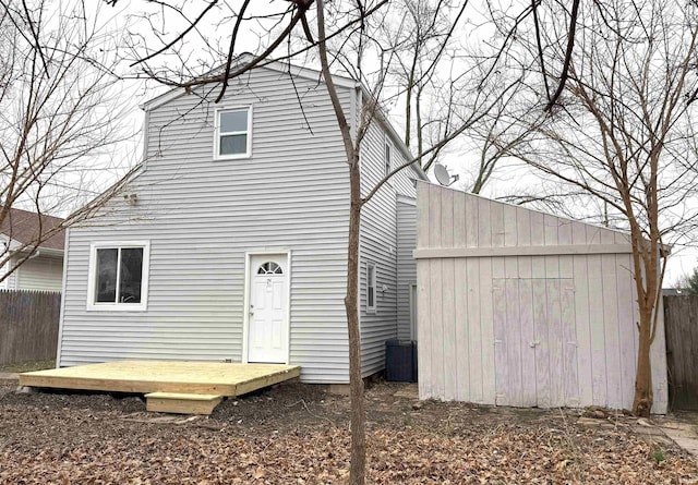 back of property with a deck