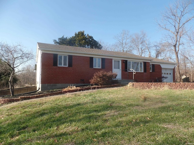 ranch-style home featuring a garage and a front lawn