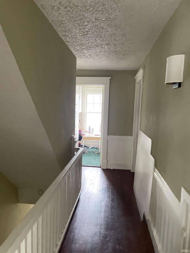 hallway with dark wood-type flooring