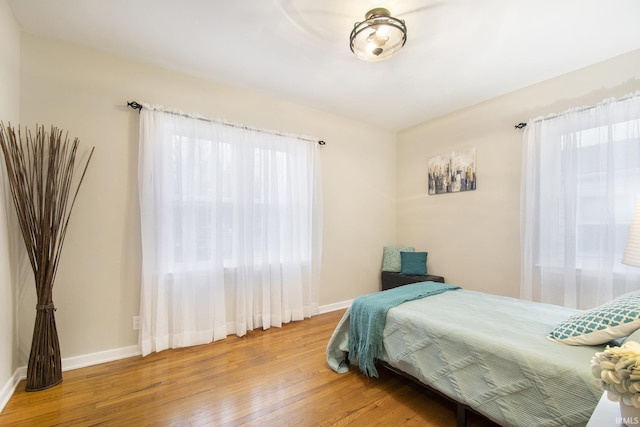 bedroom featuring hardwood / wood-style floors