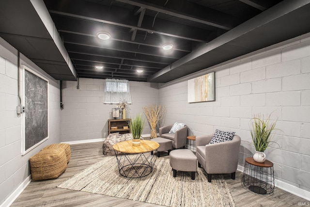 living area featuring hardwood / wood-style floors