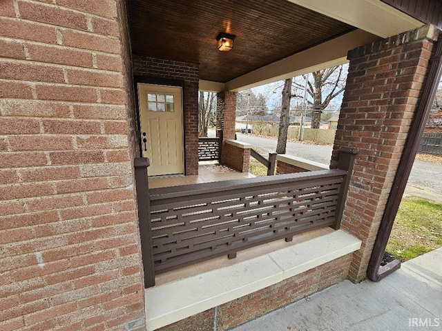 view of patio featuring a porch