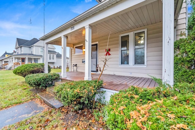 property entrance featuring covered porch