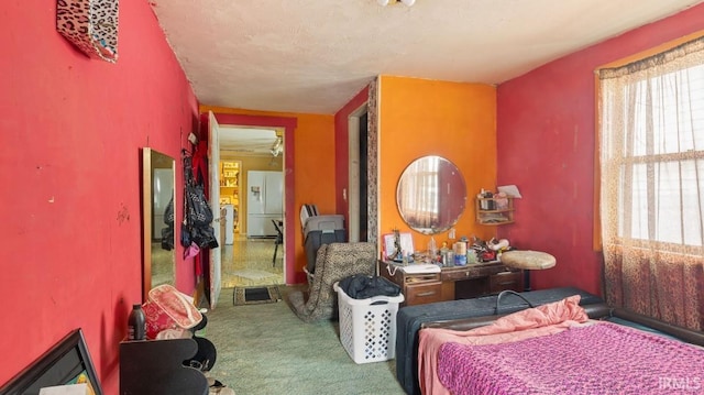 bedroom featuring carpet flooring and white fridge