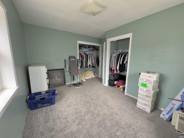 carpeted bedroom featuring a closet