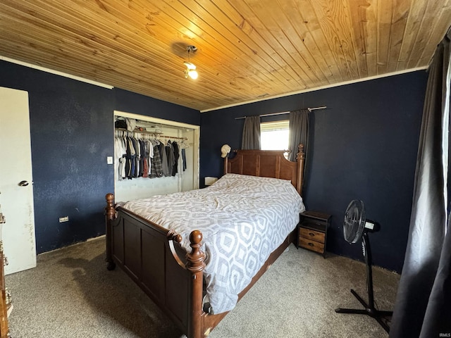 carpeted bedroom with a closet, ornamental molding, and wood ceiling