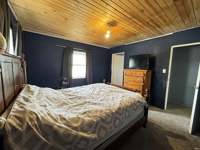 bedroom featuring wooden ceiling and carpet floors