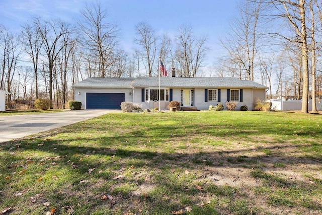 ranch-style house with a front yard and a garage