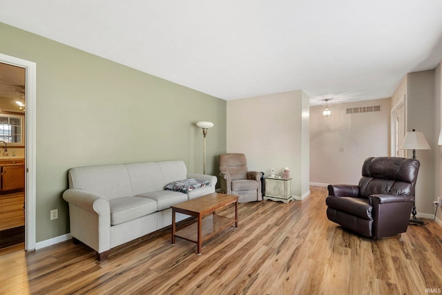 living room with hardwood / wood-style floors