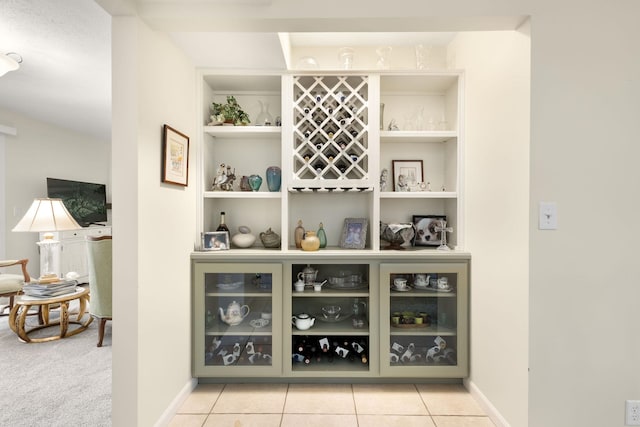 bar featuring light tile patterned flooring