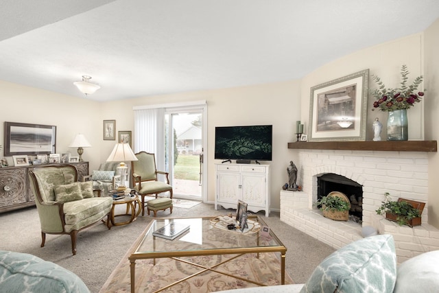 carpeted living room featuring a fireplace