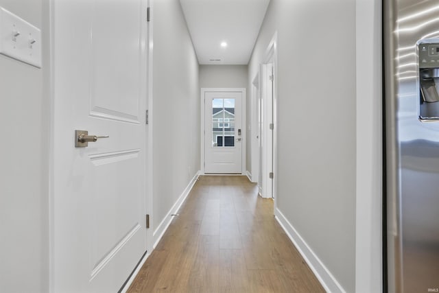 hallway featuring light hardwood / wood-style floors