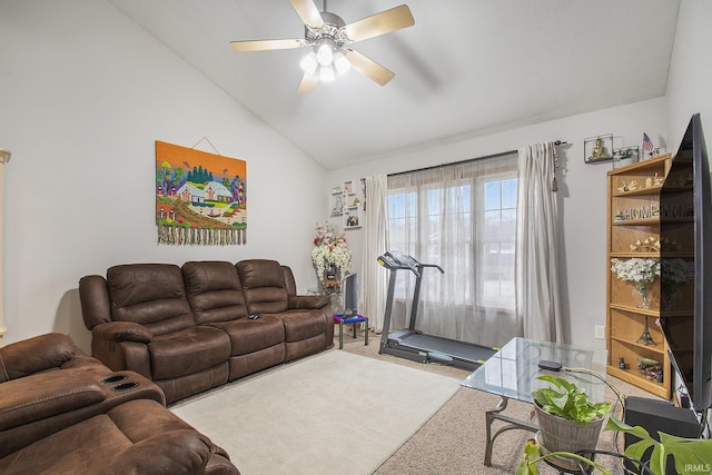 carpeted living room featuring ceiling fan and lofted ceiling