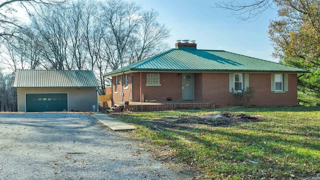 7111 Upton Rd, Mount Vernon, IN 47620 - view of front facade featuring a front yard and a garage