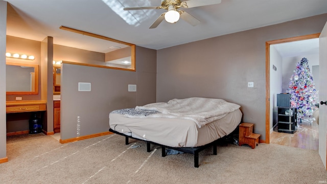 7111 Upton Rd, Mount Vernon, IN 47620 - carpeted bedroom featuring ceiling fan and ensuite bathroom