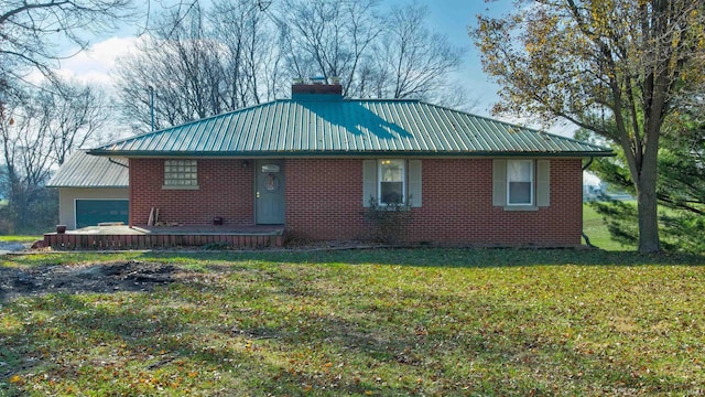 7111 Upton Rd, Mount Vernon, IN 47620 - view of side of home with a lawn and a garage