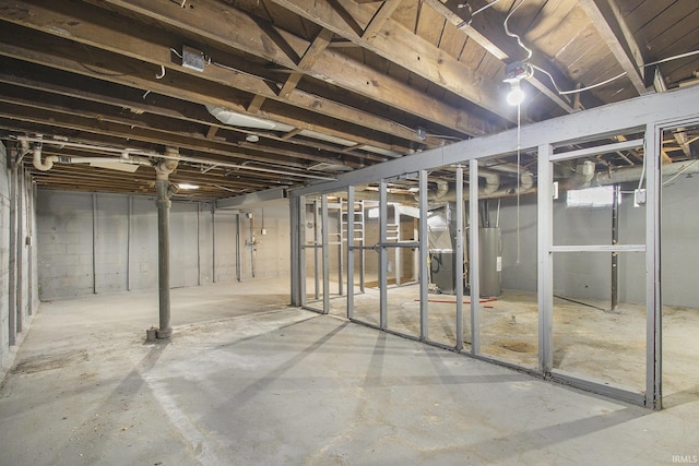 basement featuring water heater