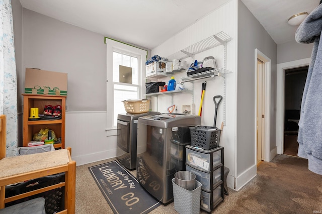 washroom with dark colored carpet and washing machine and clothes dryer