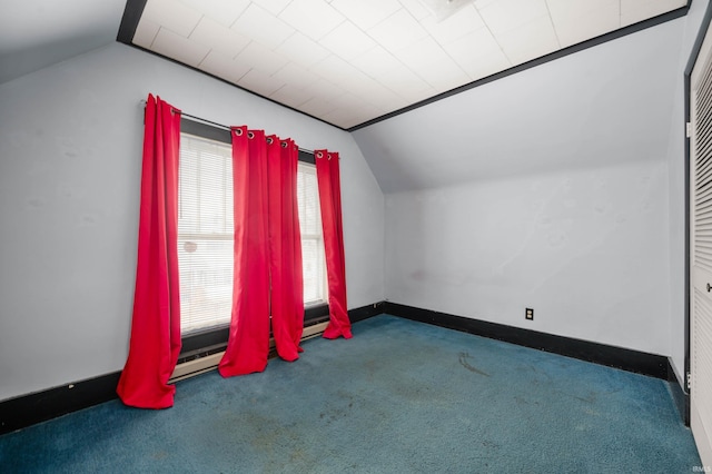 additional living space with carpet floors and lofted ceiling