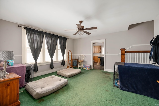 bedroom with ceiling fan and carpet floors