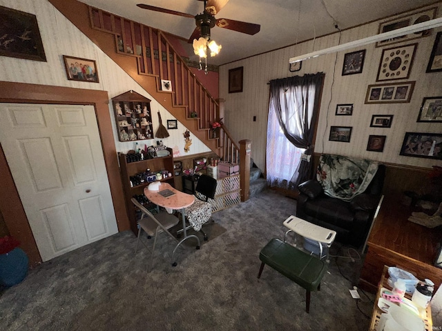 interior space with ceiling fan