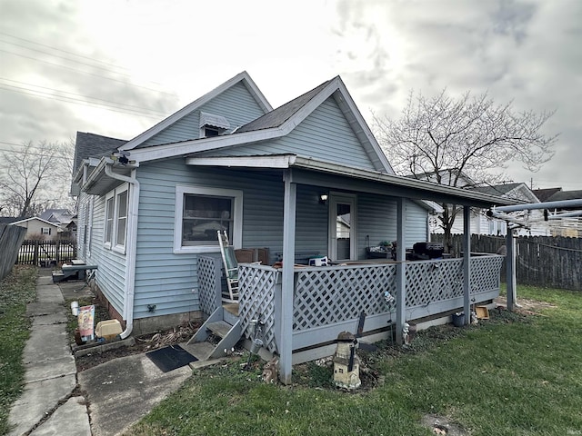 back of house with covered porch