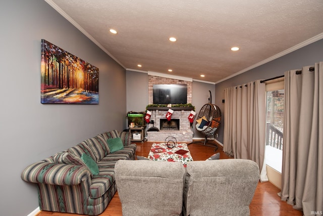 living room featuring a brick fireplace, ornamental molding, lofted ceiling, and light wood-type flooring