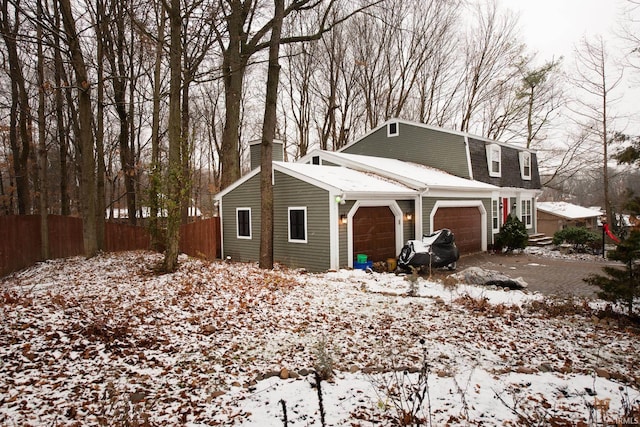 view of snow covered property