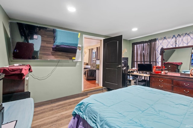 bedroom featuring light wood-type flooring