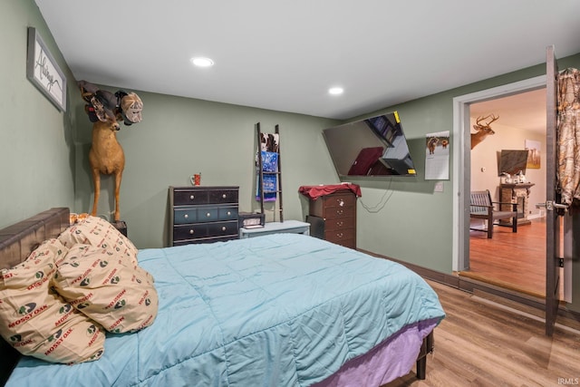 bedroom featuring hardwood / wood-style flooring