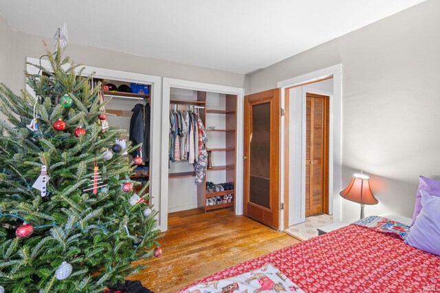 bedroom with light hardwood / wood-style floors