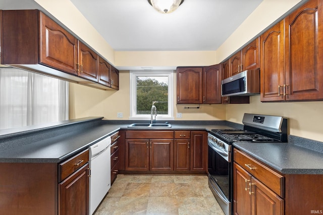 kitchen featuring sink and appliances with stainless steel finishes