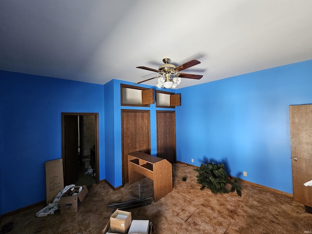 unfurnished bedroom featuring carpet flooring and ceiling fan