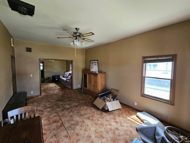 living room with carpet flooring and ceiling fan